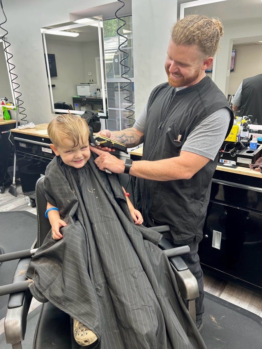 A young client all smiles in the chair