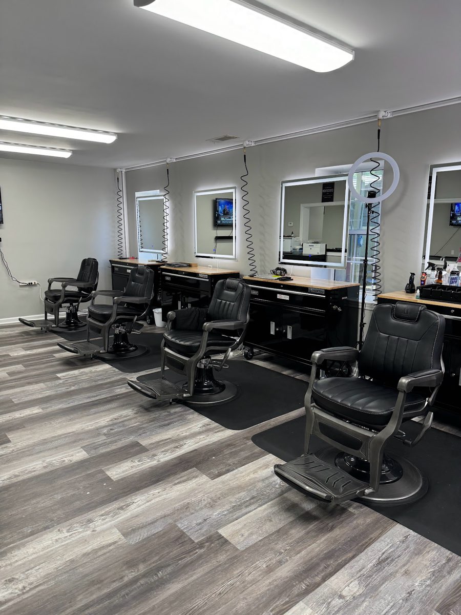 Barber chairs and stations inside the shop